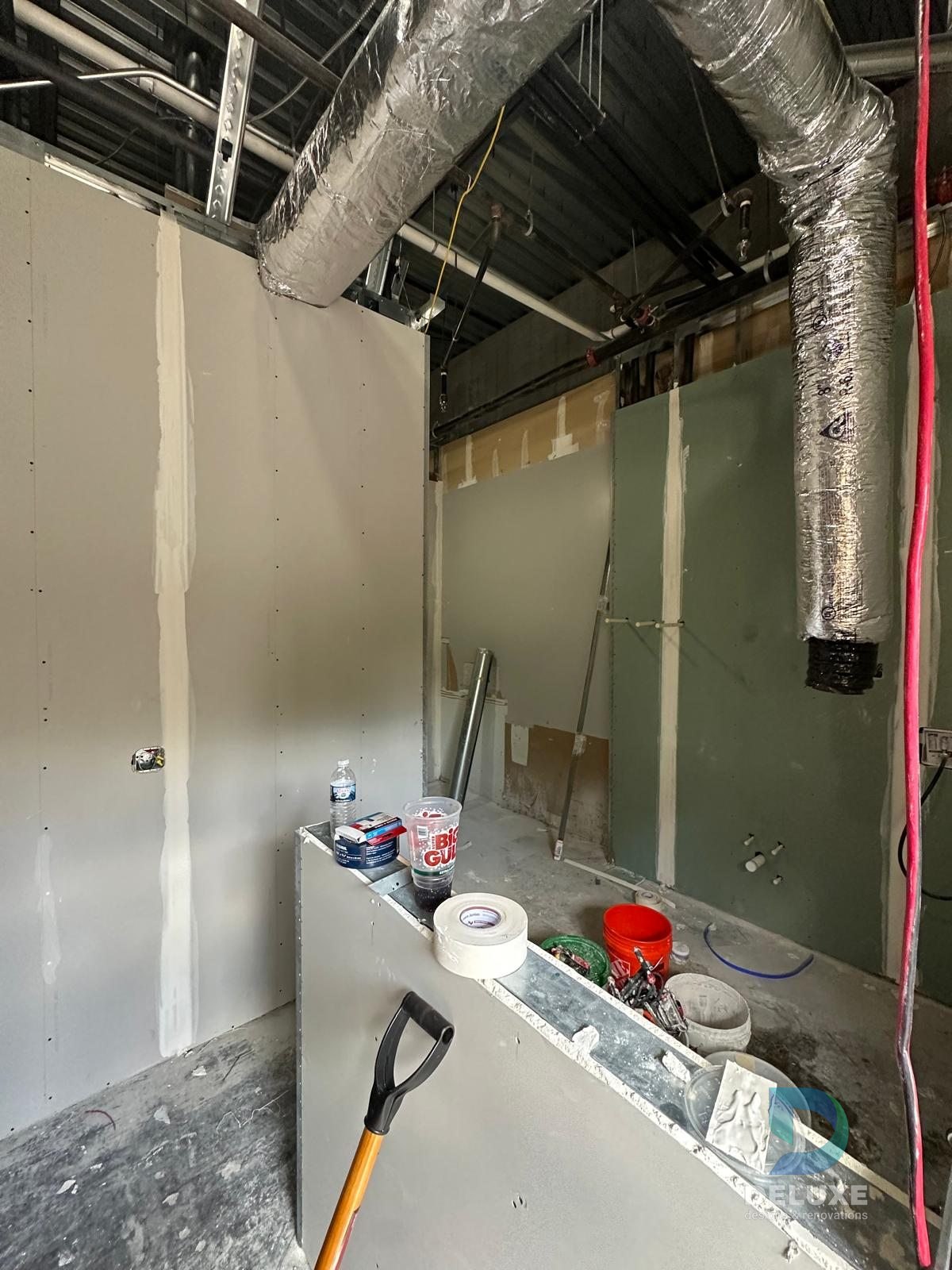 Milan Laser Valrico commercial buildout project with Deluxe Designs & Renovations watermark - Milan Laser Valrico Treatment Room Progress