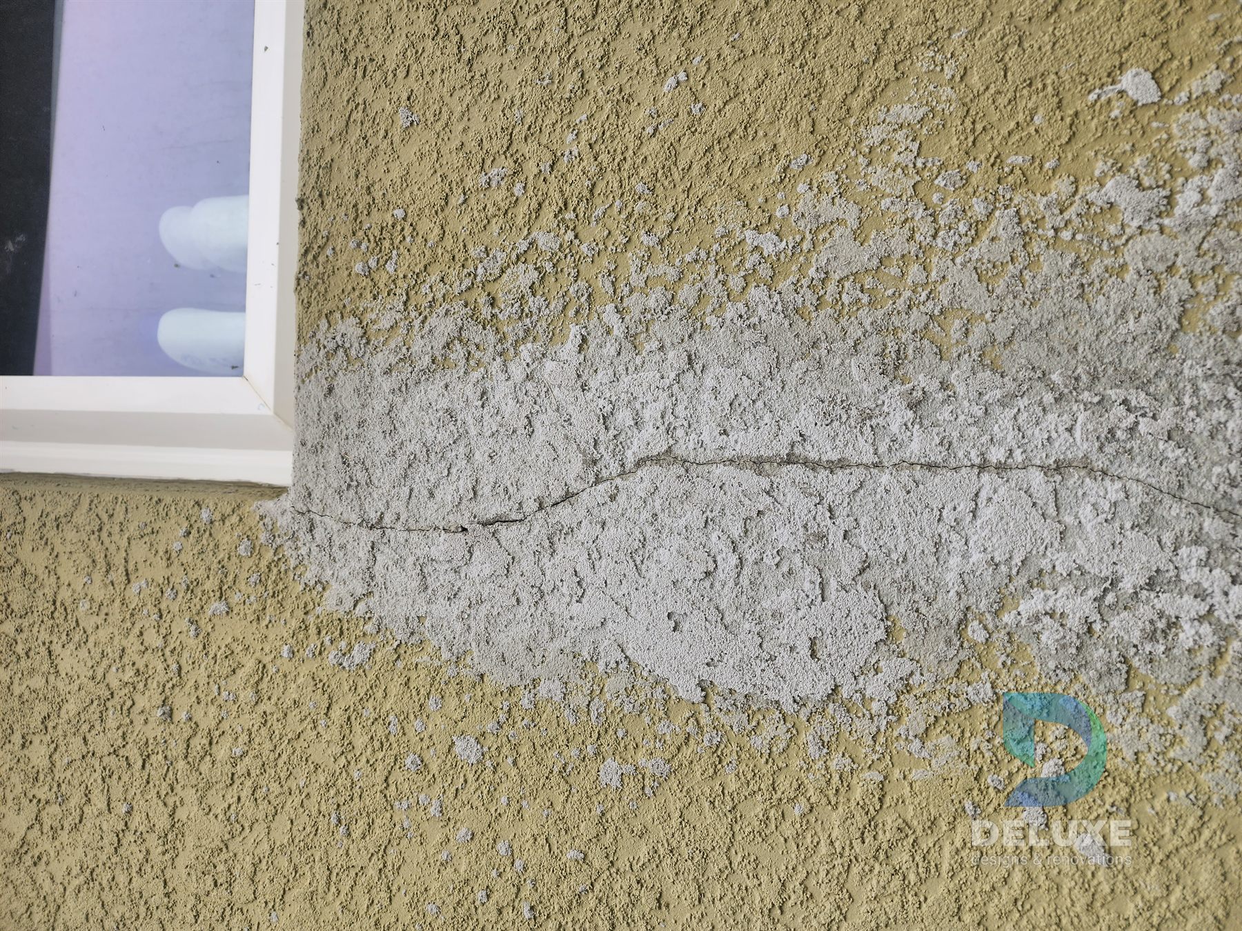 Residential exterior house painting and crack repair project photo 1