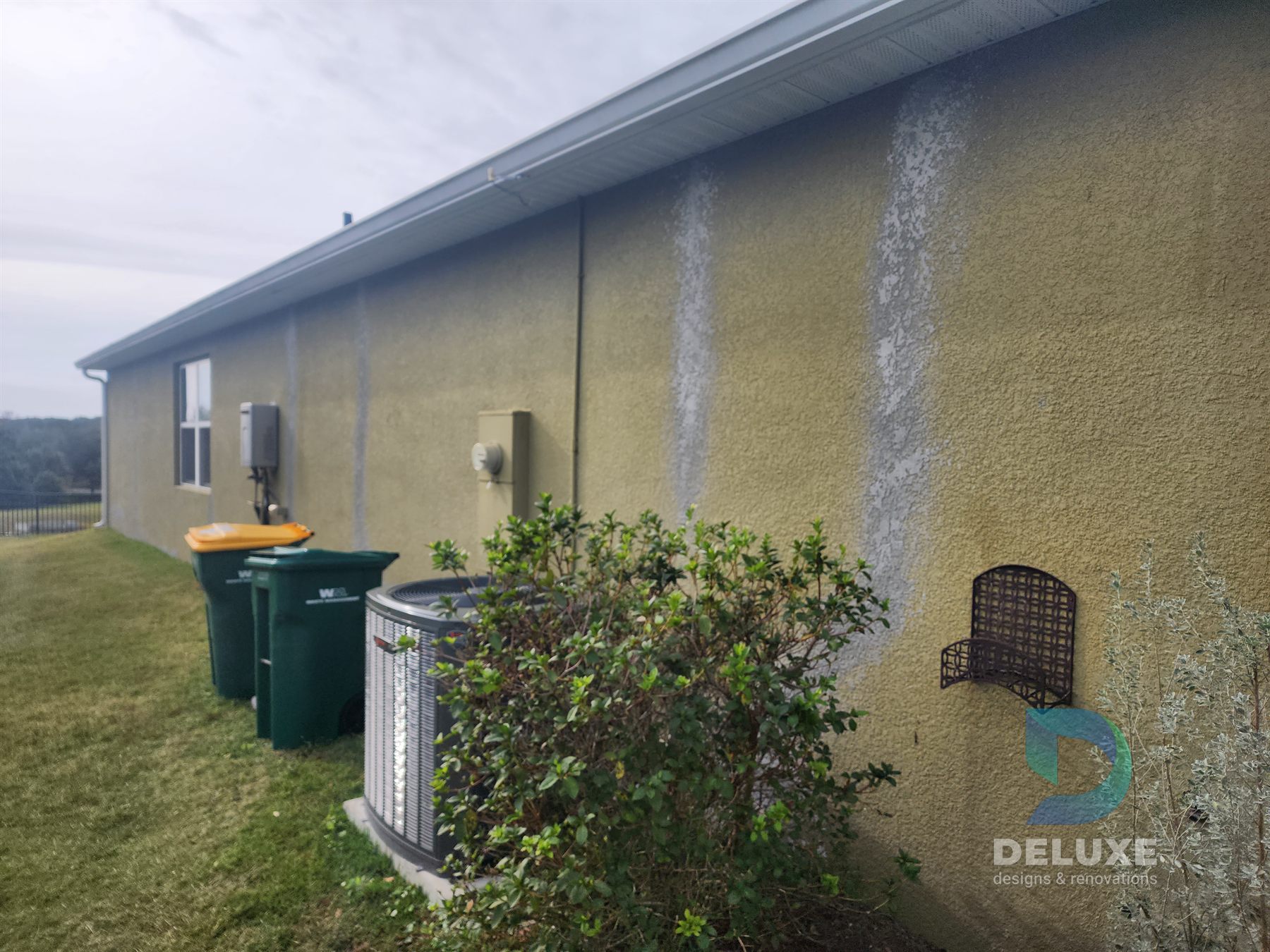 Residential exterior house painting and crack repair project photo 3