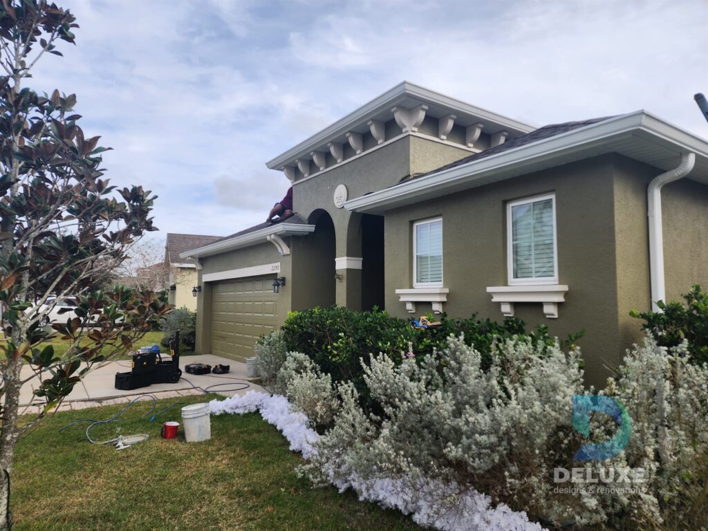 Residential exterior house painting and crack repair project photo 4