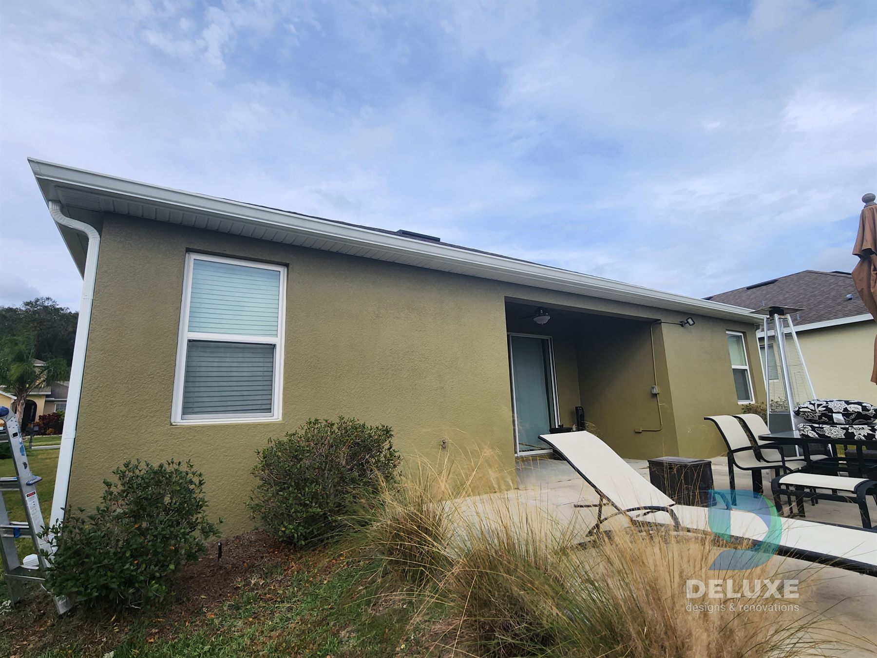 Residential exterior house painting and crack repair project photo 6