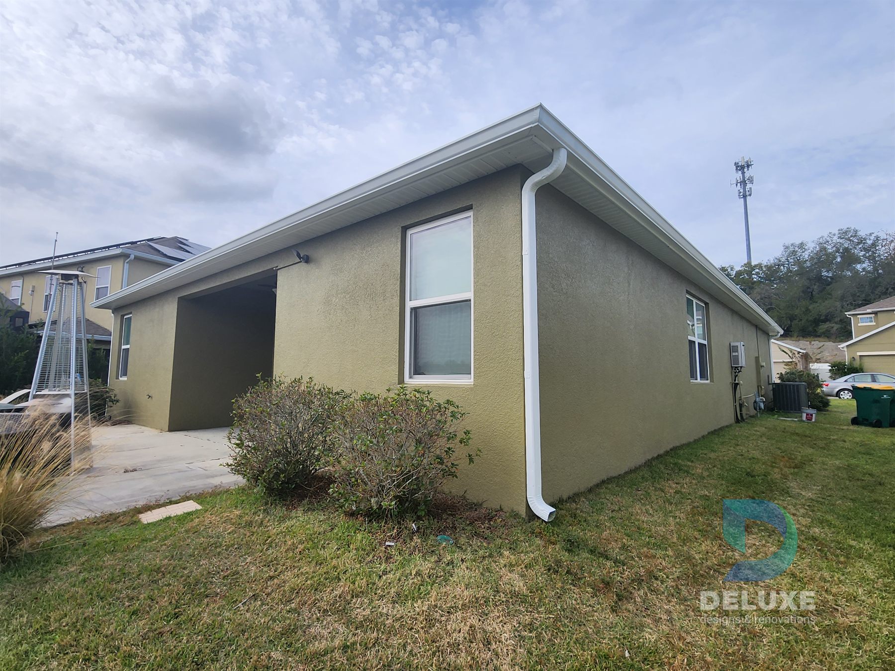 Residential exterior house painting and crack repair project photo 8