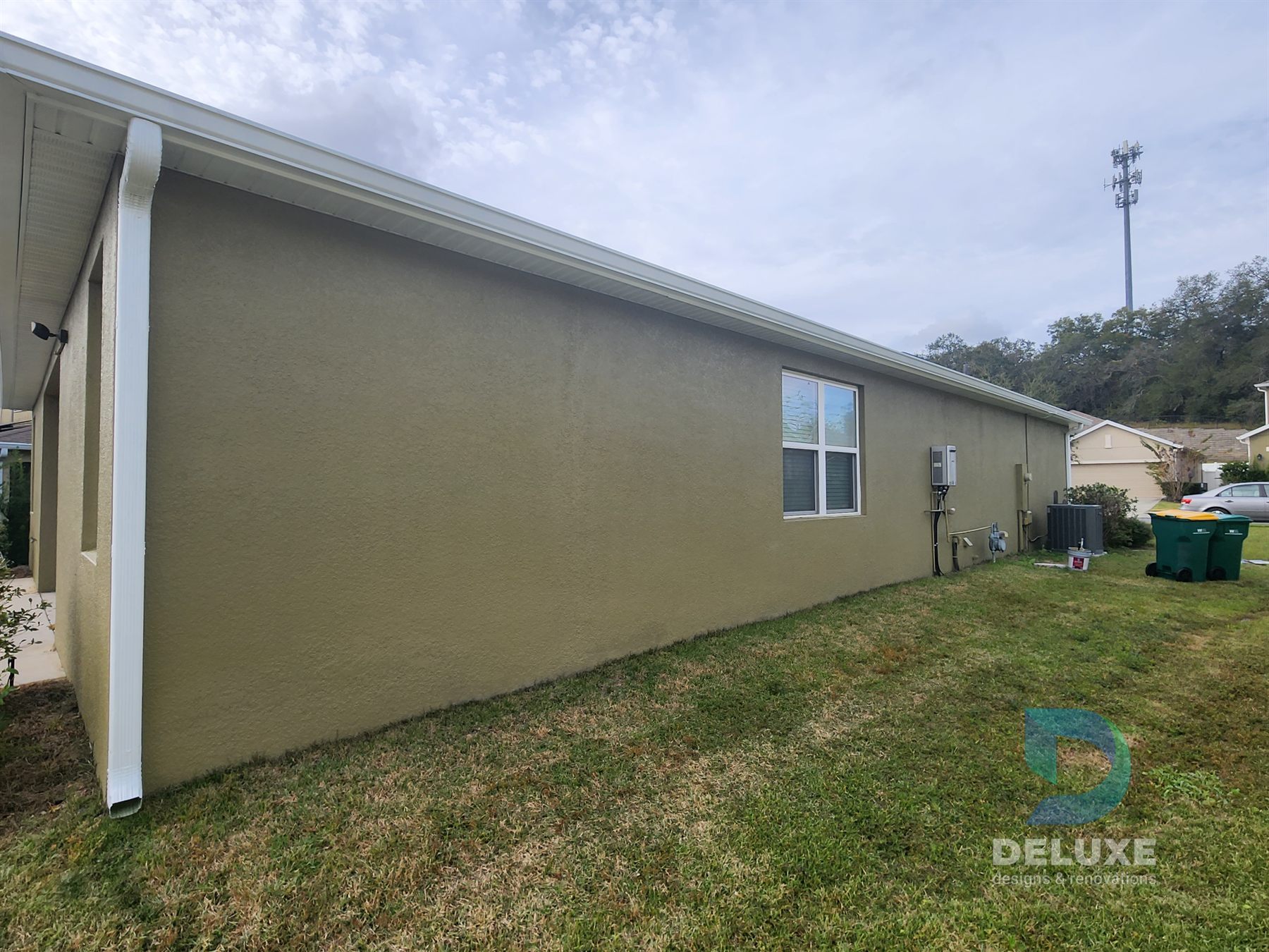 Residential exterior house painting and crack repair project photo 9