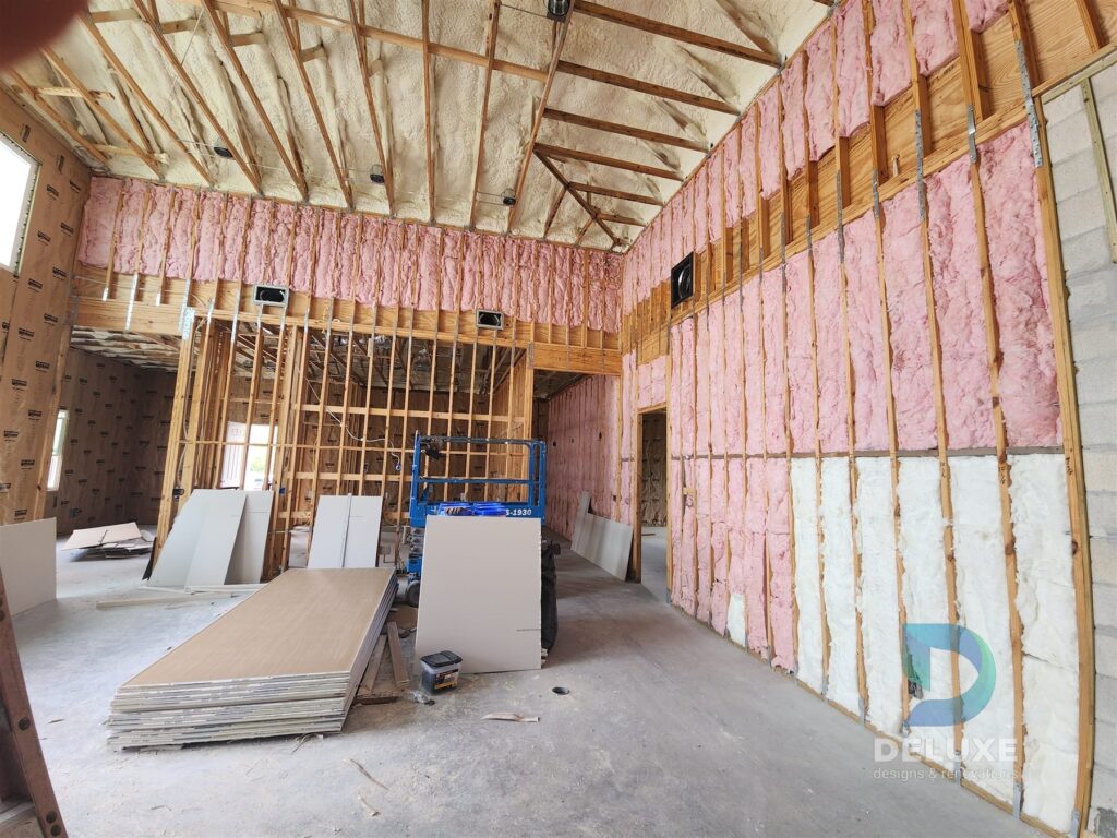Residential Orlando House drywall and insulation project with Deluxe Designs & Renovations watermark - residential orlando house wood framing insulation 02